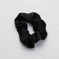 Classic black faux silk scrunchie with a satin finish and high elasticity for hair - Scrunchie_Black