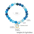Dettaglio del bracciale di perle di agata blu con ciondolo in acciaio inossidabile oro - Stile Agata Blu (E661)