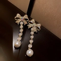 Elegant gold bow earrings with shimmering rhinestones and cascading white pearls - Gold Bowknot Pearl Gradient Earrings (17# Silver Needle - Gold)