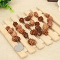 Natural 1-2cm mini pine cones for DIY crafts and Christmas decor on a wooden tray - 1-2CM Small Pinecone Flower