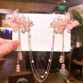 Detail of pink butterfly hair clips with golden tassels and pearls on display card - No.12 Peach Blossom Butterfly Hair Clip