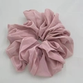 Detailed view of a soft pink chiffon oversized scrunchie with elegant ruffled texture - Pink (2-6)