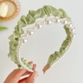 Detail of green pleated satin headband with elegant double row white pearl beads decoration - Pearl Mesh Pleated Headband / Green