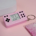 Mini console per videogiochi Tetris rosa con portachiavi in metallo su sfondo rosa - Rettangolare Rosa Profondo