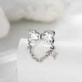 Silver bow ring with sparkling zircons and a delicate star charm chain link - White Zircon (Single)