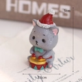 Miniature resin cat figurine in red Christmas hat playing a drum, festive holiday decor - Christmas Kitten