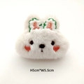 Detail of a white plush rabbit patch with soft faux fur and embroidery, 5cm by 5.5cm size - White Rabbit