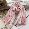 Pink and white striped cotton linen scarf with fringe tassels on artistic wire rack - Pink