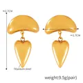 Gepolijste gouden titanium stalen hartoorbellen met geometrisch evil eye ontwerp - F1521 / Goud