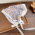 Detailed close-up of blue floral lace bandana on a rustic wooden tray for a vintage look - 25192C Blue and Yellow Small Floral