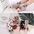 Detail of five pairs of cotton socks featuring cute cartoon animal faces and soft texture - One Size / 7014