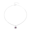 Detailed macro view of silver starburst necklace with purple stone and white diamonds - Necklace - Silver