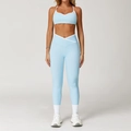 Lichtblauwe yogaset met legging met gekruiste hoge taille en sportbeha met biesjes - S / Boven- En Onderstuk / Lichtblauw (Leggings Stijl)