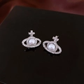 Silver Saturn stud earrings with sparkling crystals and a white center pearl - Silver Saturn Ring Style