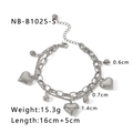 Close-up of double-layer stainless steel bracelet with hollow heart pendants and metal beads - 18K Gold / Silver (NB-B1025-S)