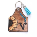 Western leather keychain with sunflower, letter V print, and blue decorative fringe - Letter V