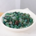 Polished natural green agate crystals in a white ceramic bowl for energy healing - Green Agate / 7-9mm 100g