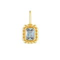 Golden vintage pendant featuring a rectangular light blue zircon with beaded edges - Blue Zirconia