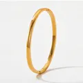 Minimalist 18K gold plated stainless steel bangle with polished finish and side clasp - Minimalist Smooth Hinged Bangle (KAS935)
