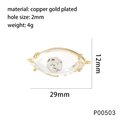 Macro detail of gold plated Evil Eye charm showing precise 29mm width and 12mm height dimensions - Champagne