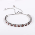 Adjustable silver bracelet featuring alternating red and white round cubic zirconia stones - Silver Red & White Zircon (B0101-4)