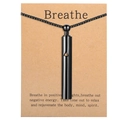Detail of black mindfulness breathing whistle pendant with triangle cutout on a gift card - HX05 (No Card) / Black