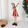 Standing Christmas reindeer plush toy with red hat and knitted details in cozy home setting - 27*52cm / Reindeer Red Small