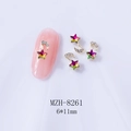 Macro detail of aurora star and moon nail art charms measuring 6x11mm on pink nail tips - Aurora Color Star Moon Combo (8261)
