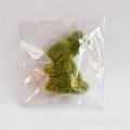 Detailed macro view of green artificial moss rabbit figurine inside protective packaging - Green (8cm) Bagged