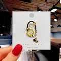 Cute enamel lion brooch with white cloud and dangling black star charm on card - 60*Cartoon Lion with Shooting Star Pin