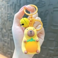 Porte-clés capybara jaune mignon avec ventre orange et clochette pour décoration de sac - Lumière Capybara Orange-Café Clair