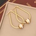 Macro detail of gold U-shaped drop earrings with sparkling pavé crystal bead charms - Waterdrop Style (2#)
