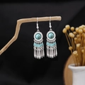 Ethnic silver-finish tassel earrings featuring turquoise beads and metal fringe design - Silver Turquoise Decorated Tassel Style (E1847-5)