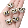 Silver owl beads for DIY bracelets featuring detailed yellow eyes in a hand display - 19x16mm Hole 3mm / Golden Cat with Yellow Eyes
