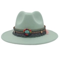 Detail of mint green felt cowboy hat with bohemian beads, turquoise, and pink tassels - Mint Green