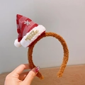 Cerchietto di peluche marrone con cappello di Babbo Natale rosso e scritta Merry - 1# Cerchietto con Cappello di Babbo Natale