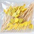 Bamboo fruit picks with yellow wooden pineapple topper in clear plastic packaging - 12cm/100 Packs / Yellow Pineapple