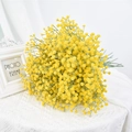 Artificial yellow ball-shaped flower bouquet on white fabric for interior decor - Yellow
