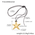 Vista detallada del colgante de estrella de mar dorada en cordón de cuero negro - Collar Cordón Cuero Estrella de Mar Dorada (P1615) / Dorado