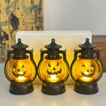 Three-piece Halloween LED pumpkin lantern set with vintage black frame and jack-o-lantern faces - Pumpkin Lantern (Set of 3)