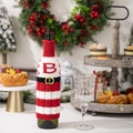 Knit Christmas wine bottle cover with red and white stripes and letter B decoration for holiday. - Knitted Letter B Wine Bottle Cover