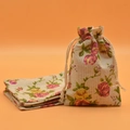 Linen drawstring jewelry gift pouch with vintage rose floral pattern on orange background - Rose