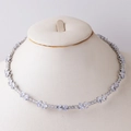 Detail of silver collar necklace with heart and teardrop zircon stones on a model - Water Drop Zirconia Style B / Silver