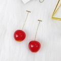 Detail view of realistic cherry earrings with resin red fruit and gold-tone stems on plush - Large Red Cherry (WG3-0608)