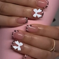 Pink leopard print press-on nails with white 3D bow accent and French tip design - White Bowknot Leopard Style (2XG1-13393)