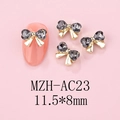Detail of 3D bow nail art charms with golden alloy base and grey heart rhinestones - Gold Base Dark Gray (AC23)
