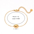 Pulsera con colgante de concha dorada de acero inoxidable con circonitas y cadena ajustable - Pulsera / Dorado