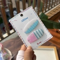 Close-up of cute acrylic hair clips with blue checkers and pink stripes with Lovely text - Two-Piece Set / Pink Yellow Flower Blue Plaid Biscuit Clip