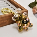Creative liquid sand turtle keychain with gold glitter and resin charms in golden finish - Glitter Black