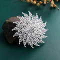 Elegant silver sunflower brooch pin with sparkling white crystals on textured green background - XD3788 Silver Sunflower